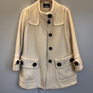 White wool coat.
